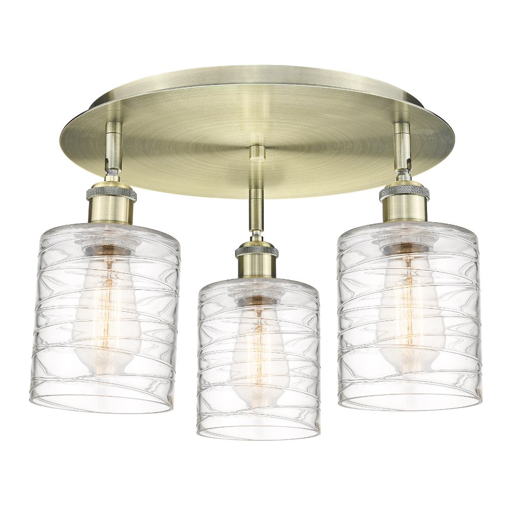 Innovations 516-3C-AB-G1113 Cobbleskill - 3 Light 17" Flush Mount - Antique Brass Finish - Deco Swirl Glass Shade