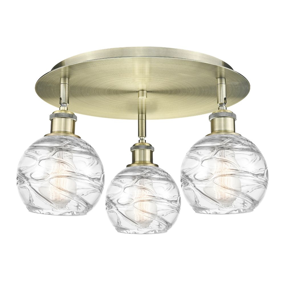 Innovations 516-3C-AB-G1213-6 Athens Deco Swirl - 3 Light 18" Flush Mount - Antique Brass Finish - Clear Deco Swirl Glass Shade