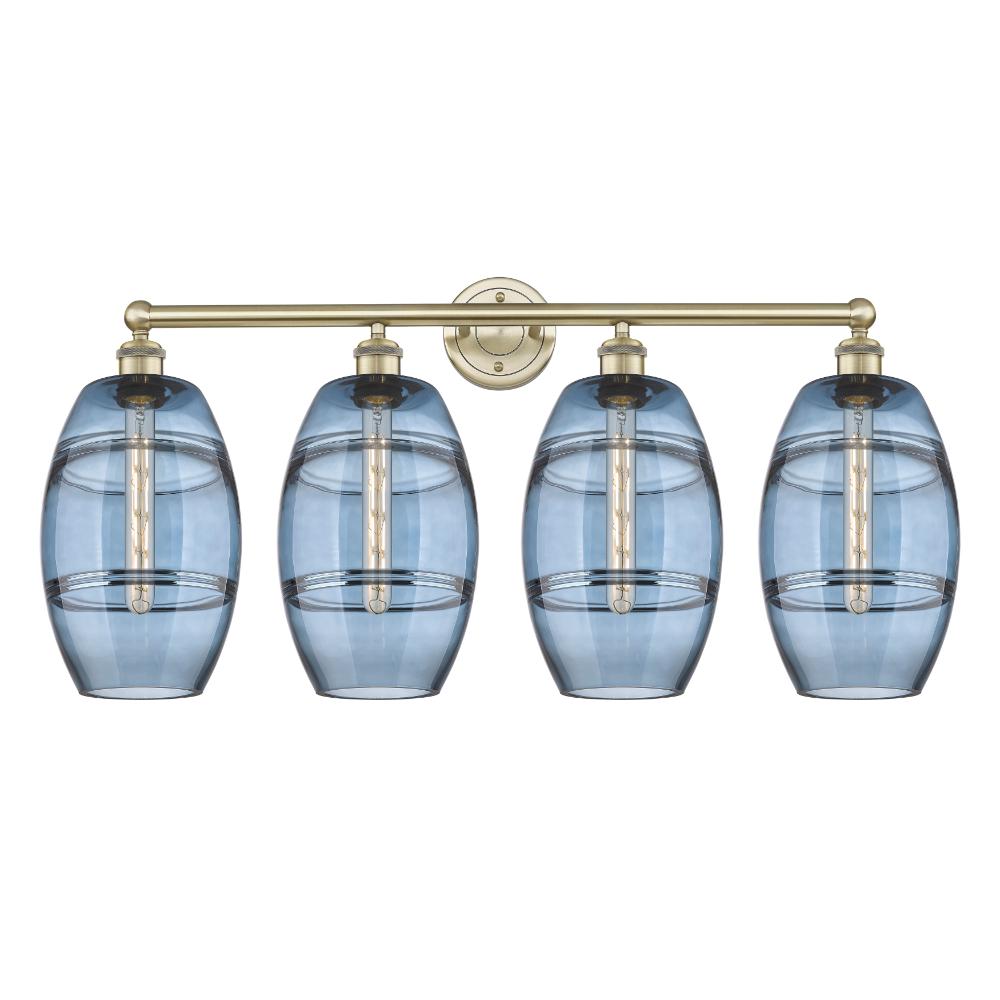 Innovations Lighting 616-4W-AB-G557-8BL Edison - Vaz - 4 Light 35" Bath Vanity Light - Antique Brass Finish - Princess Blue  Shade