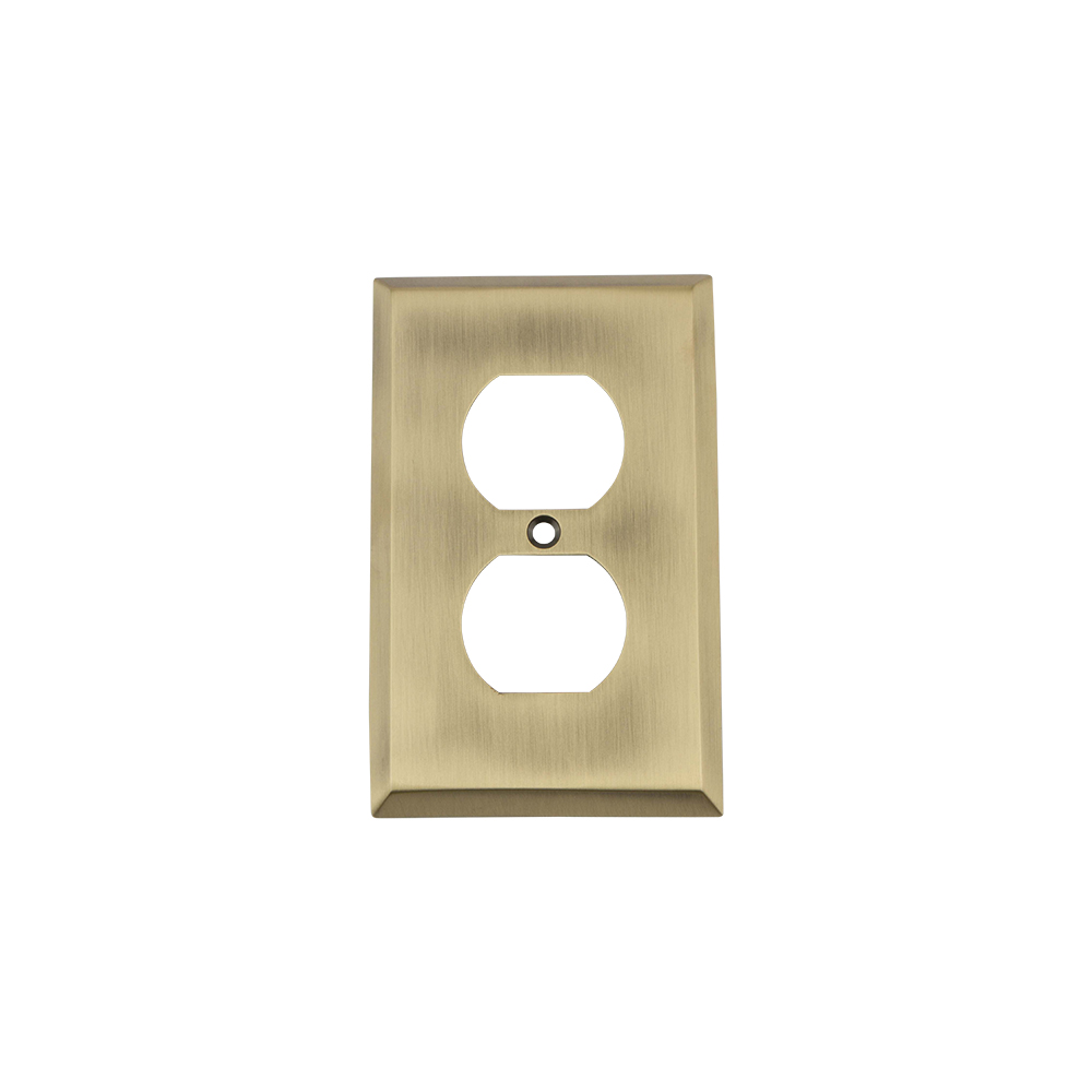 Nostalgic Warehouse NYKSWPLTD New York Switch Plate with Outlet in Antique Brass