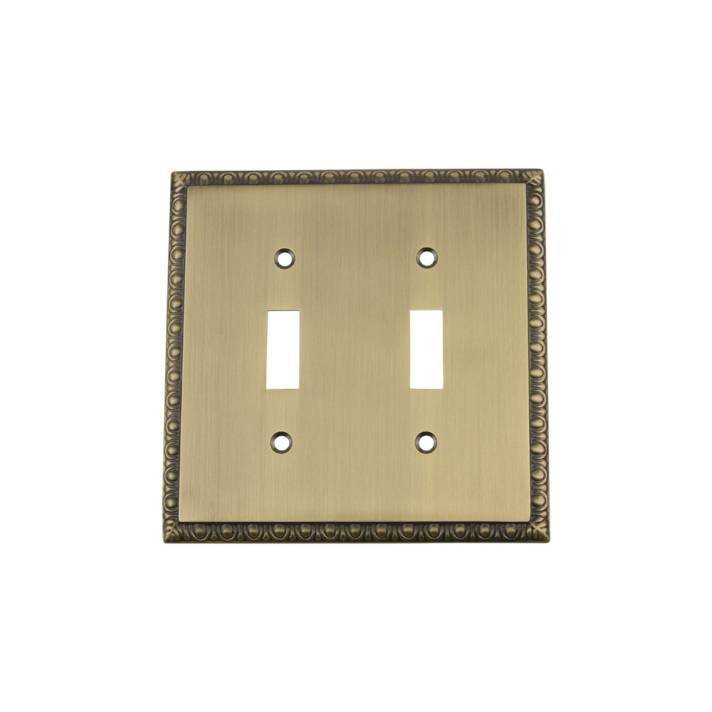 Nostalgic Warehouse EADSWPLTT2 Egg & Dart Switch Plate with Double Toggle in Antique Brass