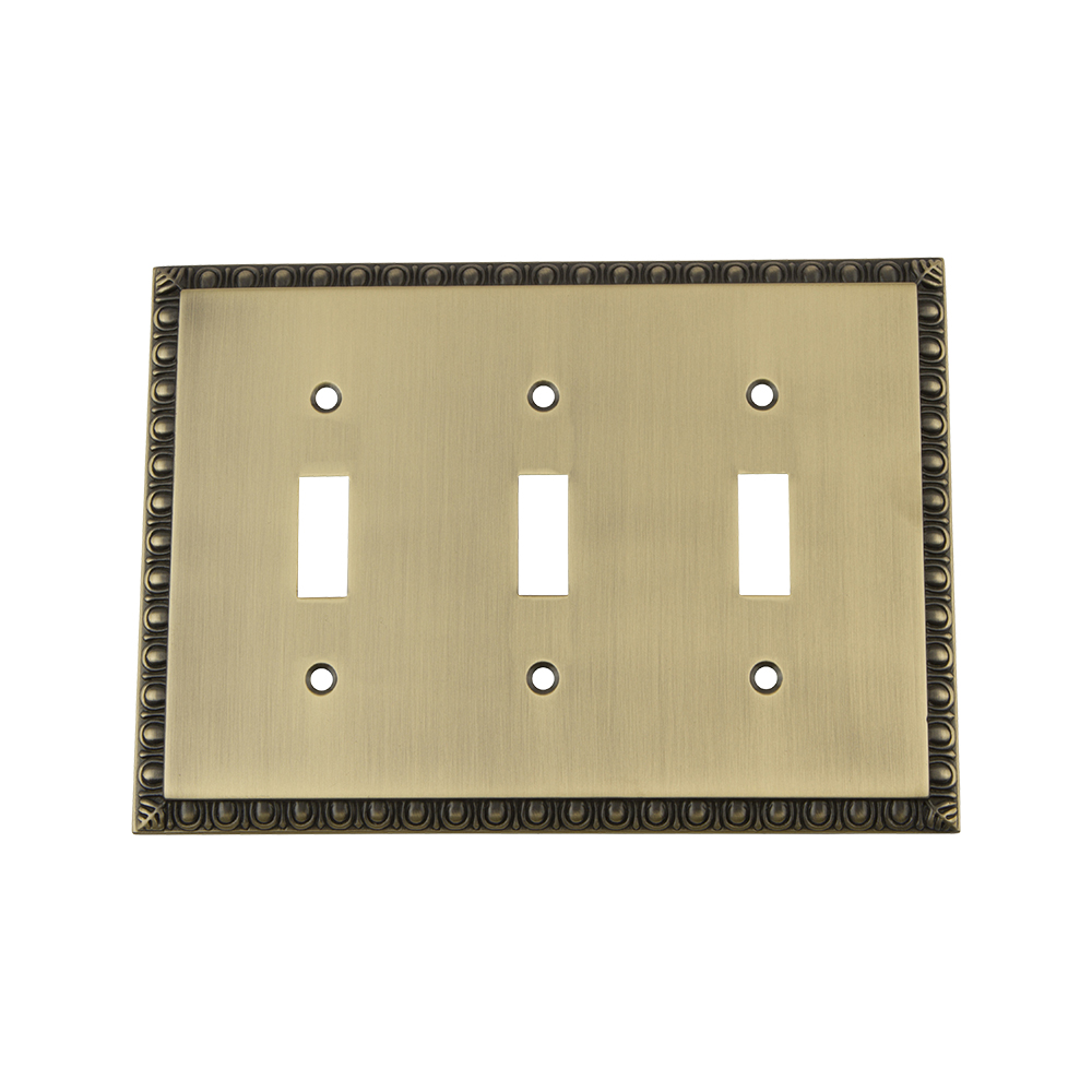Nostalgic Warehouse EADSWPLTT3 Egg & Dart Switch Plate with Triple Toggle in Antique Brass