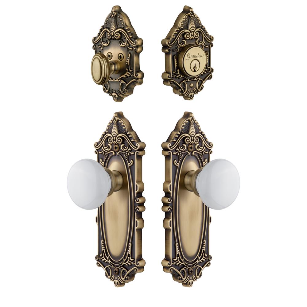 Grandeur by Nostalgic Warehouse GVCHYD Grande Vic Plate with Hyde Park Porcelain Knob and matching Deadbolt in Vintage Brass