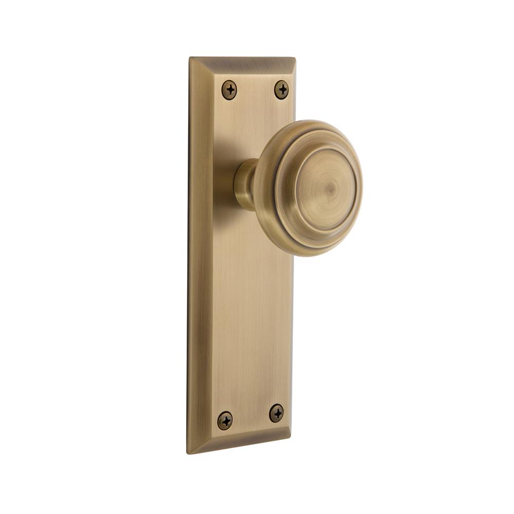 Grandeur by Nostalgic Warehouse FAVCIR Grandeur Fifth Avenue Plate Passage with Circulaire Knob in Vintage Brass