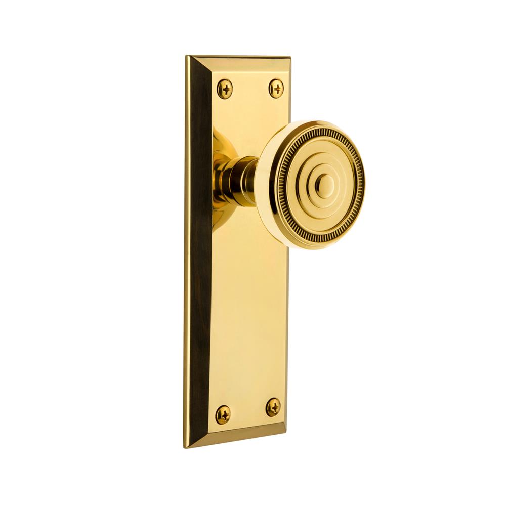 Grandeur by Nostalgic Warehouse FAVSOL Grandeur Fifth Avenue Plate Passage with Soleil Knob in Polished Brass