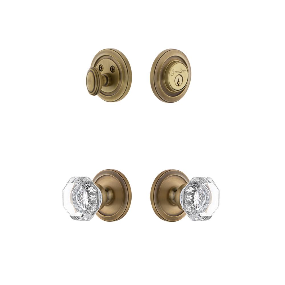 Grandeur by Nostalgic Warehouse CIRCHM Circulaire Rosette with Chambord Crystal Knob and matching Deadbolt in Vintage Brass