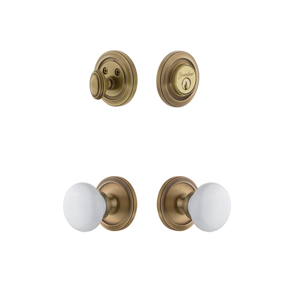 Grandeur by Nostalgic Warehouse CIRHYD Circulaire Rosette with Hyde Park Porcelain Knob and matching Deadbolt in Vintage Brass