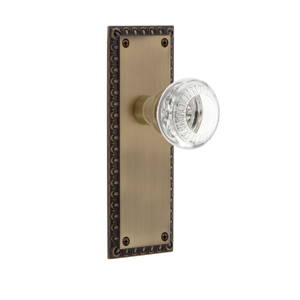 Nostalgic Warehouse AEDCAE Nostalgic Warehouse Neoclassical Plate Passage with Crystal Neoclassical Knob in Antique Brass