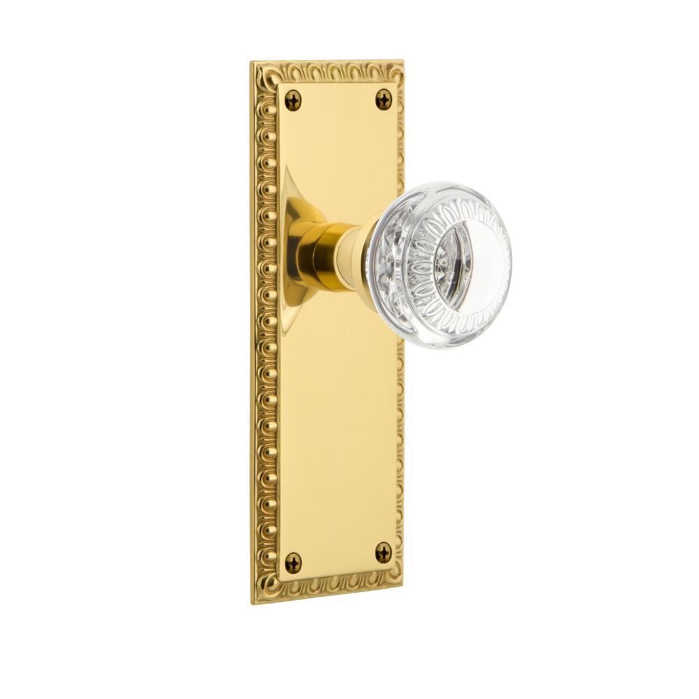 Nostalgic Warehouse AEDCAE Nostalgic Warehouse Neoclassical Plate Passage with Crystal Neoclassical Knob in Polished Brass