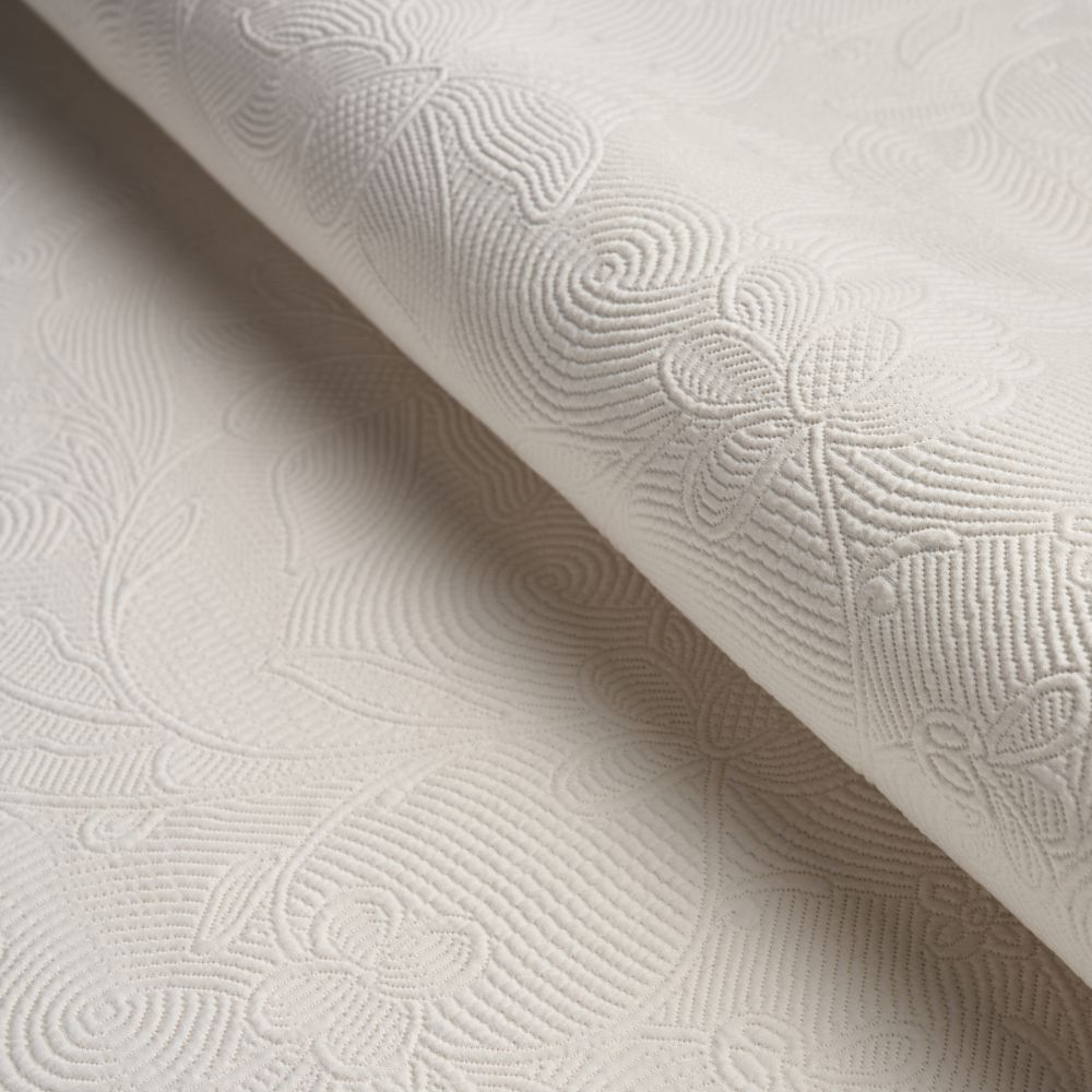 Schumacher 81590 Quilted Scroll Matelassé Fabrics in Ivory